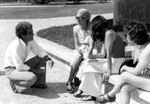 Professor Charles Talking to Students Outside by University of North Florida