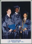 Three University of North Florida Graduates Wearing Regalia by Bob Knight PhotoMarketing Inc.