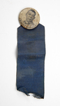 Ribbon badge with attached button: Image of Booker T. Washington, past president of National Negro Business League