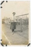 Woman Standing on Tennis Court