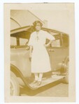 Woman Standing on Automobile Running Board