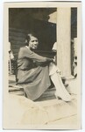 Woman Seated on Steps