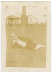 Woman Laying on Grass