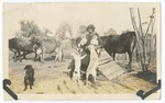 Woman Sitting Outside Surrounded By Dogs and Cattle by Fox Tone Print, Fox Co.