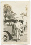 Man Leaning on Automobile