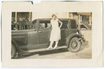 Woman Standing on Running Board