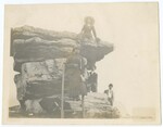Eartha White and Unidentified People on Rock Formation