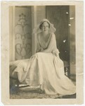 Unidentified Woman Sitting on Chaise