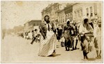 Unidentified Women and Men Walking in Street