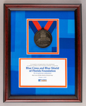 University of Florida Medallion to Blue Cross Blue Shield of Florida Foundation plaque by University of Florida