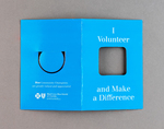 Blue Community Champions “I Volunteer and Make a Difference” metal bookmark in promotional bi-fold card, undated by Blue Cross and Blue Shield of Florida, Inc.