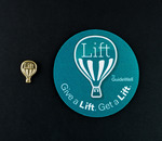 “Lift” Hot Air Balloon pin, undated; “Lift” Gift a Lift. Get a Lift coaster, undated by Blue Cross and Blue Shield of Florida, Inc.