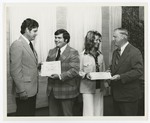 J. W. Herbert Presents Certificates of Qualification by Blue Cross of Florida, Inc. and Blue Shield of Florida, Inc.