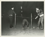 Employee Playing Limbo at Skateland