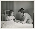 Promotional Photograph: Nurse Taking Blood Pressure by Blue Cross and Blue Shield of Florida, Inc.
