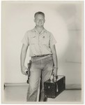 Promotional Photograph: Man With Toolbox by Blue Cross and Blue Shield of Florida, Inc.