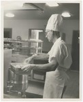 Promotional Photograph: Cook In Industrial Kitchen by Blue Cross and Blue Shield of Florida, Inc.