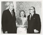 Mr. And Mrs. Miller Standing With Broward Williams by Blue Cross and Blue Shield of Florida, Inc.