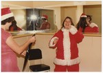 Putting On The Santa Suit by Blue Cross and Blue Shield of Florida, Inc.