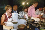 Cyrus Jolivette and others cooking at "Interactive Dinner" by Blue Cross and Blue Shield of Florida, Inc.