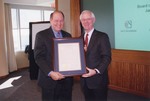 Michael Cascone with Robert M. Beall II (?) by Blue Cross and Blue Shield of Florida, Inc.