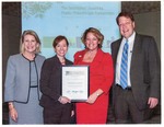 Susan Towler receiving The Secretaries' Award for Public-Philanthropic Partnerships on behalf of the Blue Foundation by Blue Cross and Blue Shield of Florida, Inc.