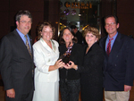 Susan Towler with award by Blue Cross and Blue Shield of Florida, Inc.
