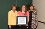 Susan Towler presenting 100th grant award by Blue Cross and Blue Shield of Florida, Inc.