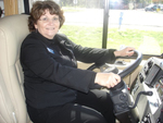 Susan Wildes in BCBSF van at "Just for Grins" event by Blue Cross and Blue Shield of Florida, Inc.
