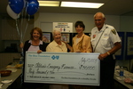 Check presentation to Children's Emergency Resources with Susan Towler by Blue Cross and Blue Shield of Florida, Inc.