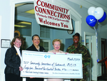 Check presentation to Community Connection with Susan Towler by Blue Cross and Blue Shield of Florida, Inc.