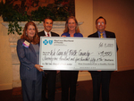 Check presentation to We Care Polk by Blue Cross and Blue Shield of Florida, Inc.