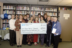 Check presentation to Women's Center of Jacksonville with Susan Towler by Blue Cross and Blue Shield of Florida, Inc.