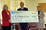 Check presentation to St. Petersburg Free Clinic by Blue Cross and Blue Shield of Florida, Inc.