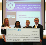 Check presentation to Tampa Bay Healthcare Collaborative by Blue Cross and Blue Shield of Florida, Inc.