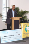 Tony Jenkins speaking at Hispanic Health Initiatives check presentation by Blue Cross and Blue Shield of Florida, Inc.