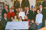 Check presentation to Lee's Place with Susan Wildes by Blue Cross and Blue Shield of Florida, Inc.