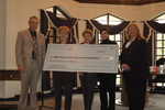 Check presentation to University of Florida Speech & Hearing Clinic by Blue Cross and Blue Shield of Florida, Inc.