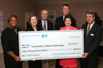 Check presentation to Community Asthma Partnership by Blue Cross and Blue Shield of Florida, Inc.