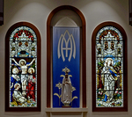 Crucifixtion and Marian window with an Our Lady of Fatima Statue in the Middle by James Dwight Davis