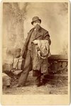 Mounted Photograph: Portrait of man with a case, Signed J.S. Mitchell on front, Stamped with Photographer's mark on reverse Jacksonville, Florida 1870-1890 by J S. Mitchell