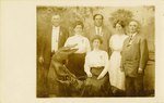 Postcard: Family Portrait with Taxidermied Alligator, Jacksonville, Florida 1900-1910