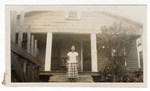 Photograph: Portrait, Unidentified Woman In Front of House by R. Lee Thomas