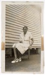Photograph: Portrait, Unidentified Woman Sitting Outside by R. Lee Thomas