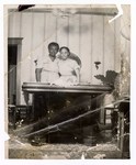 Photograph: Portrait, Two Women Standing Behind Table by R. Lee Thomas