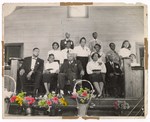 Photograph: Group Portrait, Unidentfied People In Church by R. Lee Thomas