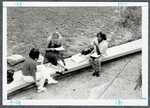Unidentified People Studying Outside by Spinnaker Media