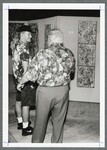Unidentified People at Art Exhibit by Spinnaker Media